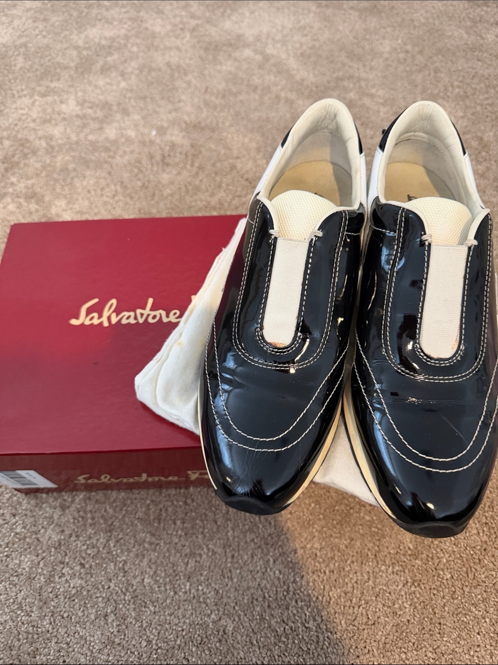 Salvatore Ferragamo Black Patent Slip-On Sneakers with Cream Details